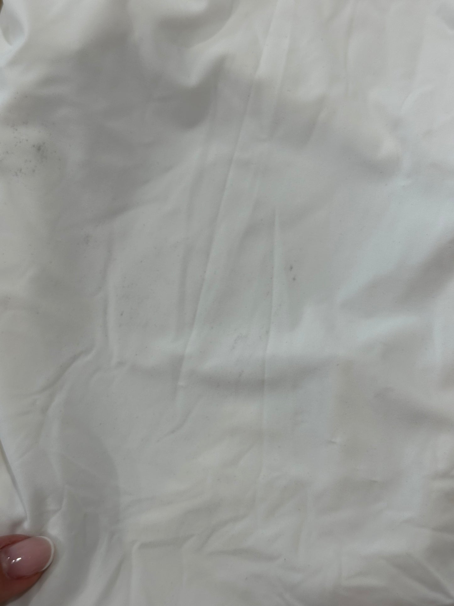 BODY ELLIE BLANC taille L - petit trou et trace noire